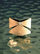 “Butterfly”, gold brooch, partly black, princess-cut diamond.