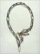 “Double Kernel Necklace”, matte black silver- and gold necklace.